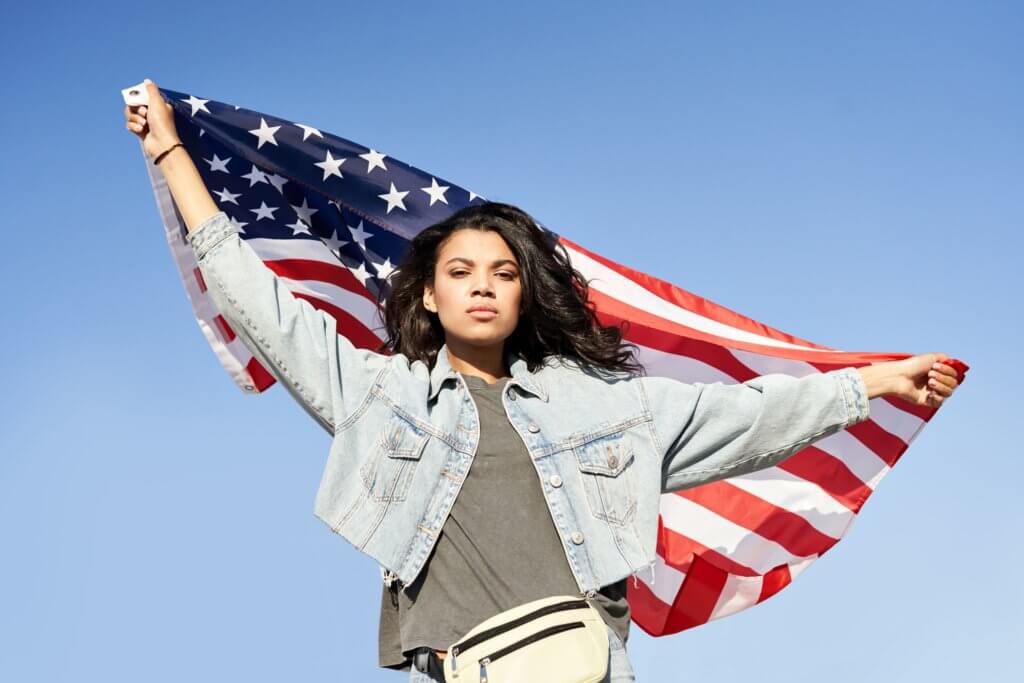 Woman holding the U.S. flag 