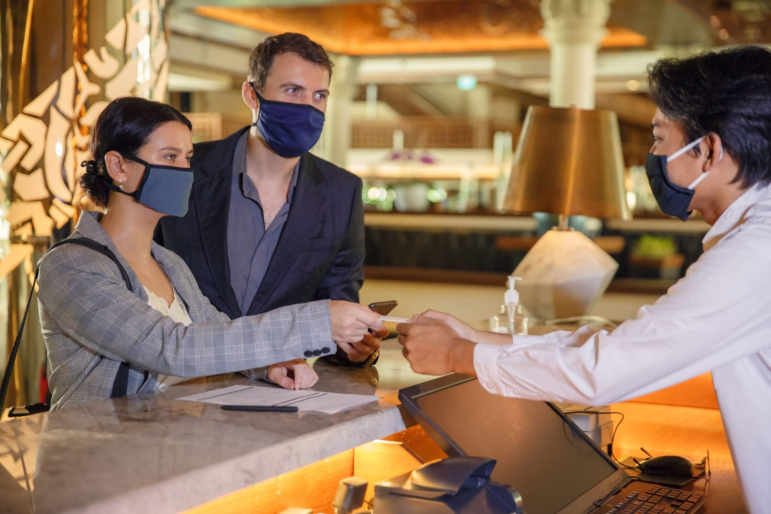 checking into a hotel and wearing masks