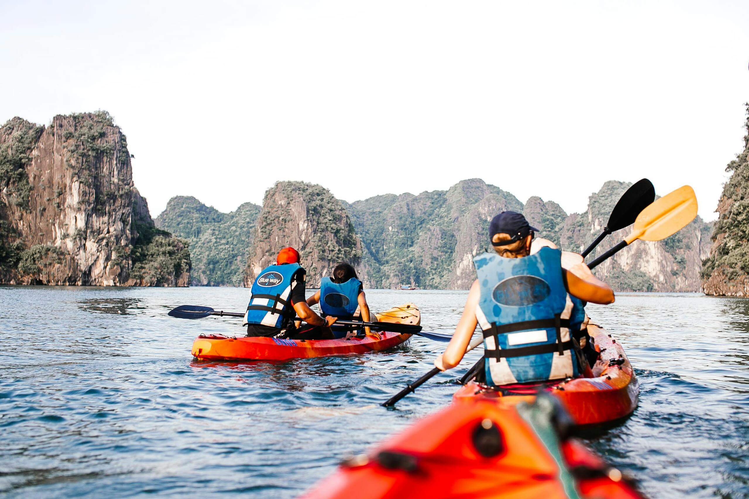 People Riding Kayak